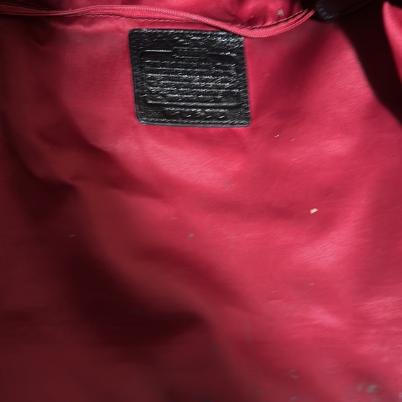 Coach purse black with red lining. Preowned good condition. - Picture 5 of 9